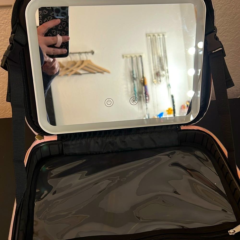 Travel makeup case with LED mirror